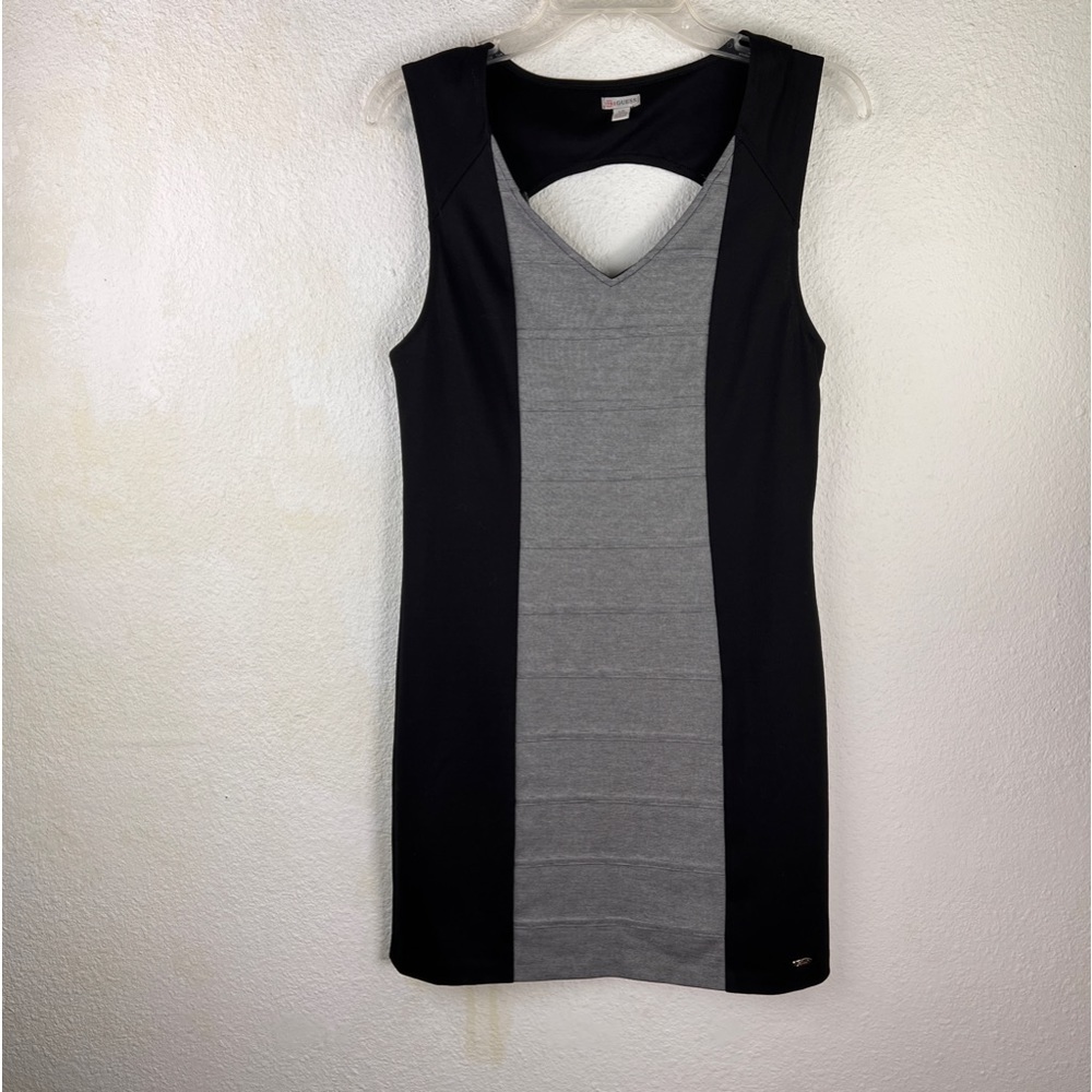 GUESS Black with Micro Black/White stripe panels. V-neck, keyhole back, side zip